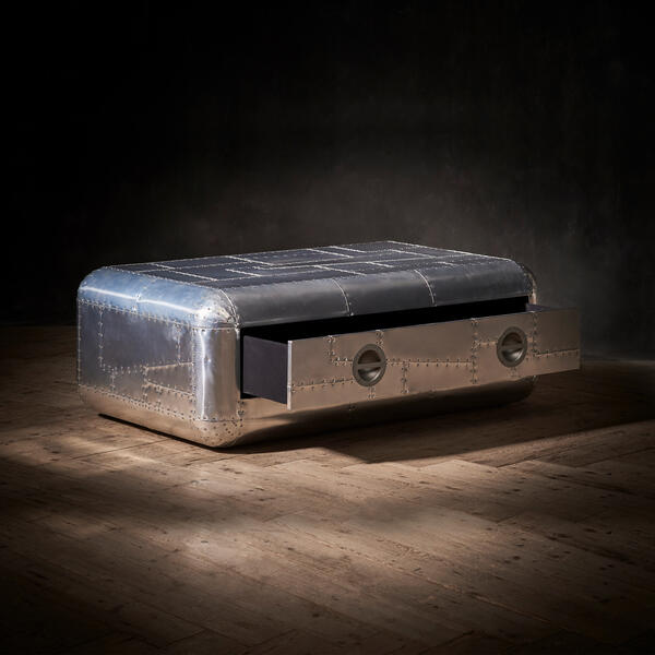 An aluminium Aviator coffee table inspired by two different military aircraft, melded together in one cool design.