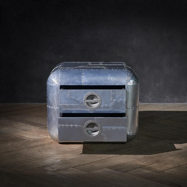 An aluminium Aviator side table inspired by two different military aircraft, melded together in one cool design.