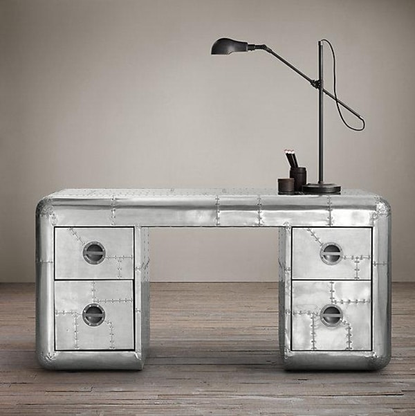 An aluminium Aviator desk inspired by two different military aircraft, melded together in one cool design.