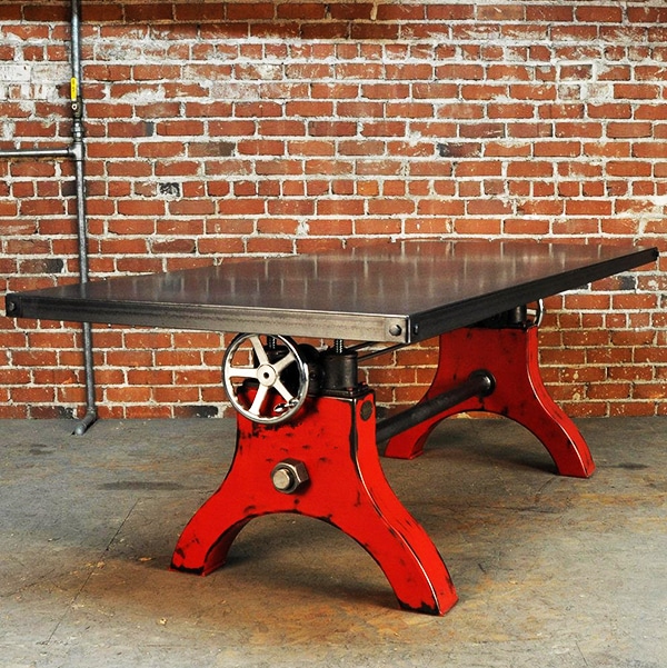 A sexy red Crank table, adjustable from 75 cm to 105 cm in height.
