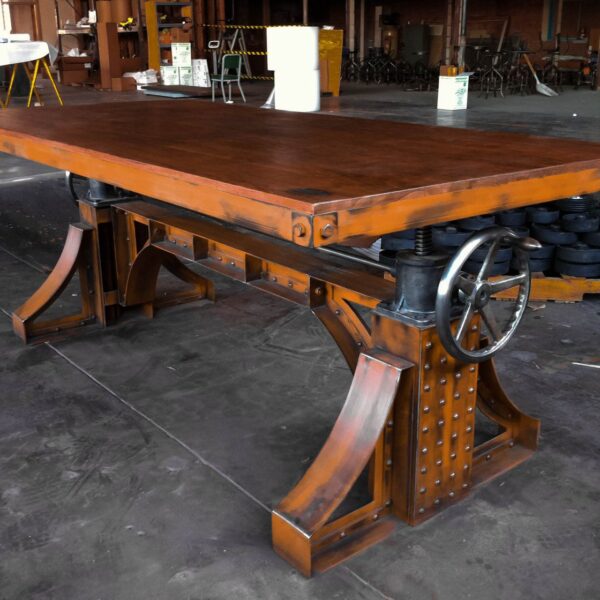 This orange industrial Crank table Nuuk has best of two worlds.