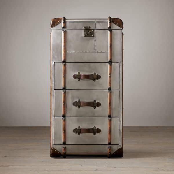 Wooden frames are wrapped in aluminum patchwork finish, our Richards' Trunk Cabinet.