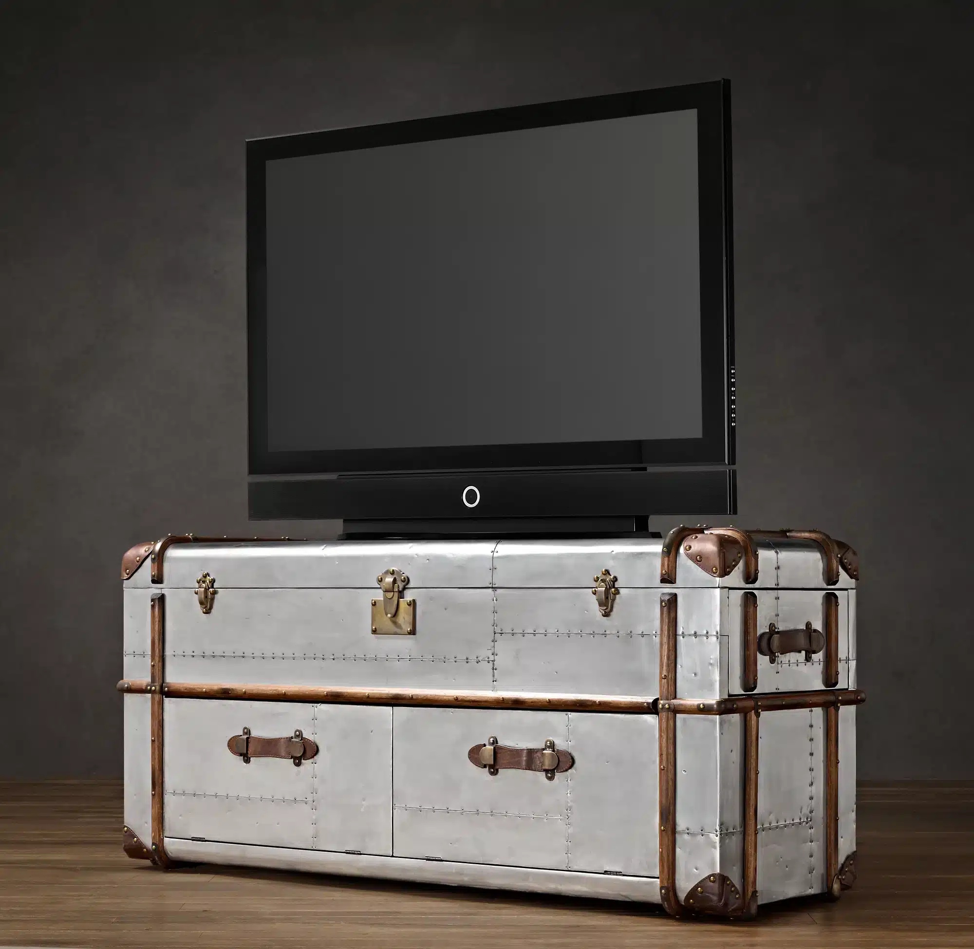 The Richards' Trunk tv cabinet is inspired by a worn, custom-made steamer Trunk.